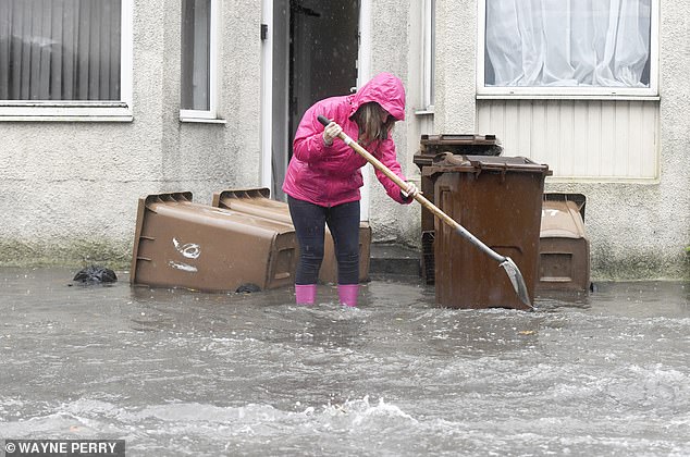 The happiest place in Britain...? Plymouth was deluged by rain on June 12