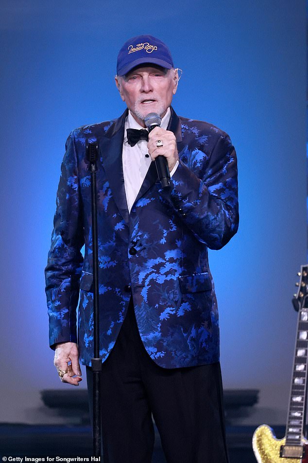 Beach Boys' Mike Love said he felt the 'presence' of his Brian Wilson when he was inducted into the Songwriters Hall of Fame on Thursday just one day after his death