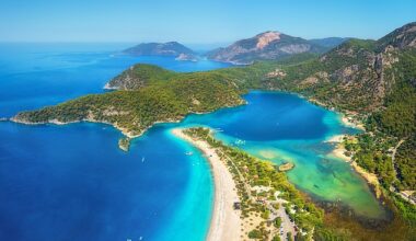 The beautiful beach named 'sunniest in Europe' - with crystal-clear waters, 10 hours of sunshine a day and cheap holiday deals