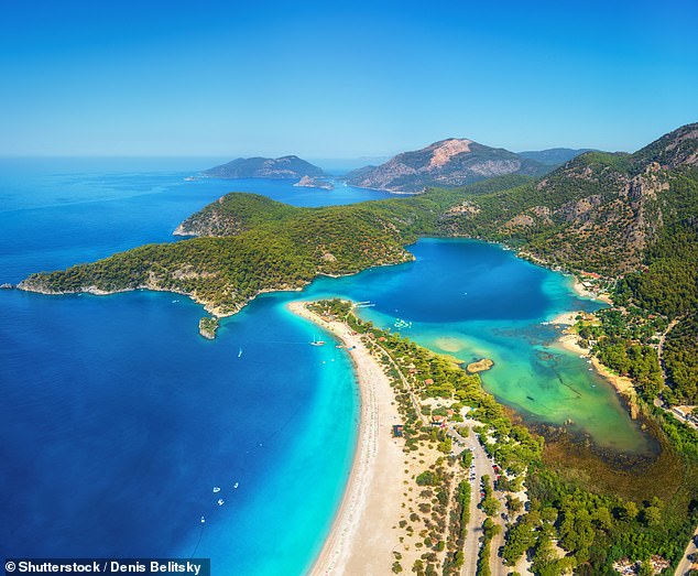 The beautiful beach named 'sunniest in Europe' - with crystal-clear waters, 10 hours of sunshine a day and cheap holiday deals