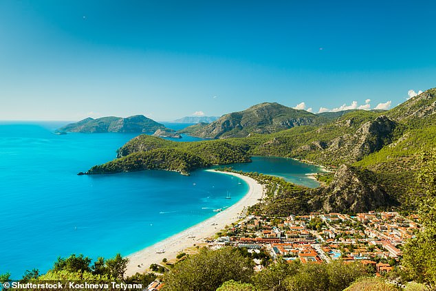 Known as the 'Blue Lagoon', Oludeniz Beach has crystal-clear water, golden sand and mountain scenery