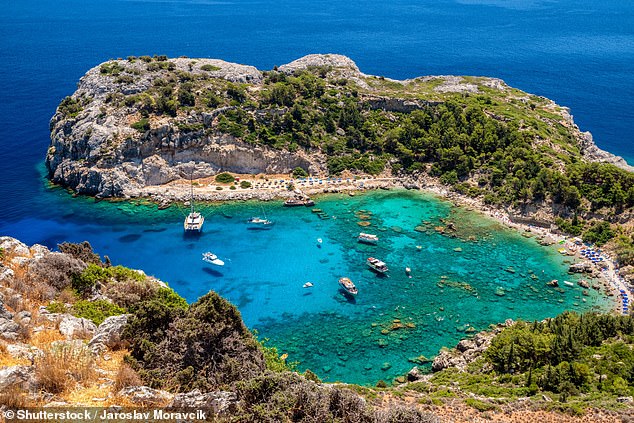 Anthony Quinn Bay is 250m long and is backed by palm trees. It's known for being a quiet and safe place to swim