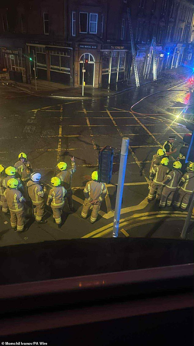 Two firefighters also required medical attention, one of them after being struck by 'falling masonry' as a result of the inferno