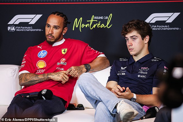 Colapinto, right, sits alongside seven-time world champion Lewis Hamilton in a press conference