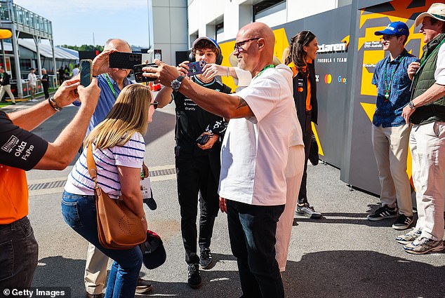 Nowadays, the F1 paddock is far more glamorous than it used to be, with fans desperate for a moment with their icons. Pictured is Mercedes driver Kimi Antonelli