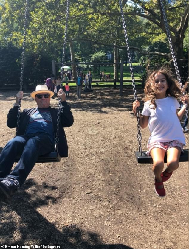 Heming continued: 'What Bruce teaches our girls goes far beyond words. Resilience, unconditional love, and the quiet strength in simply being present. This photo says so much. Love deepens. It adapts. It stays, even when everything else changes'