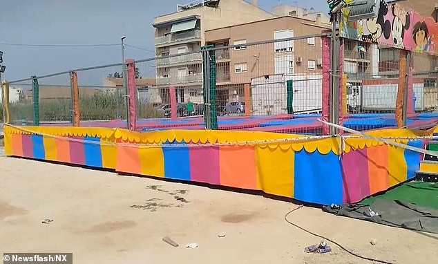 A two-year-old Spanish girl has died and three other children left injured after hitting an electrified fence while bouncing on a local fairground trampoline (pictured) in the village of Alquerías, near the city of Murcia