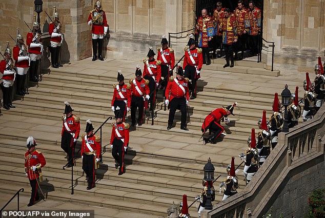 A stumble on the steps after the Order of the Garter service at St George's Chapel