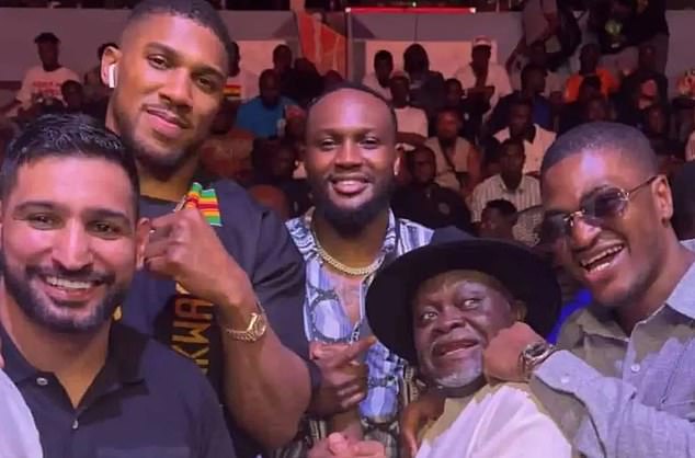 Amir Khan and Anthony Joshua (both left) were pictured together at an event in Ghana