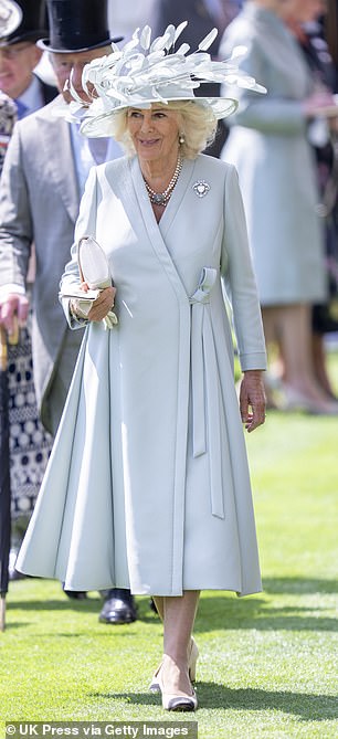 The King and Queen were dressed in typical Ascot finery