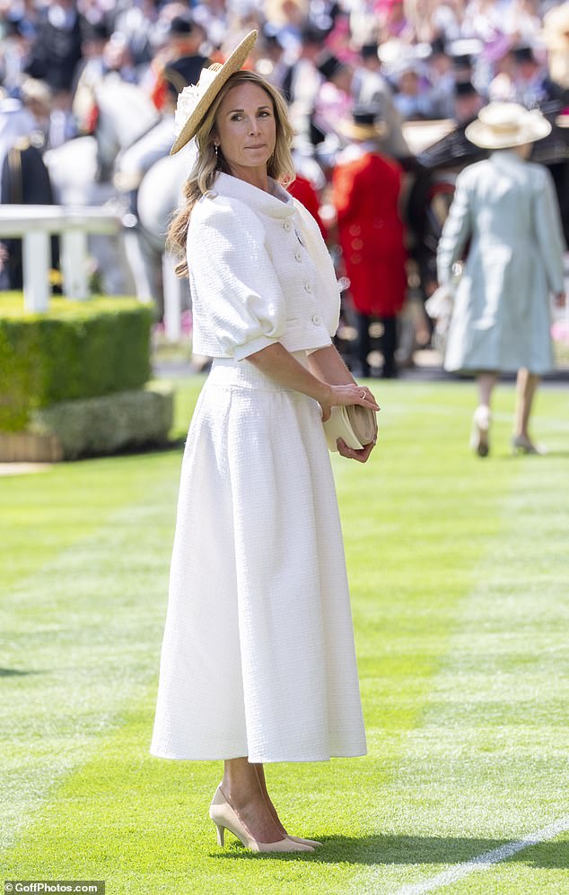 Harriet, 45, played the part perfectly in an all-white ensemble featuring a cropped jacket with puffed sleeves, and accessorising with a smart woven hat