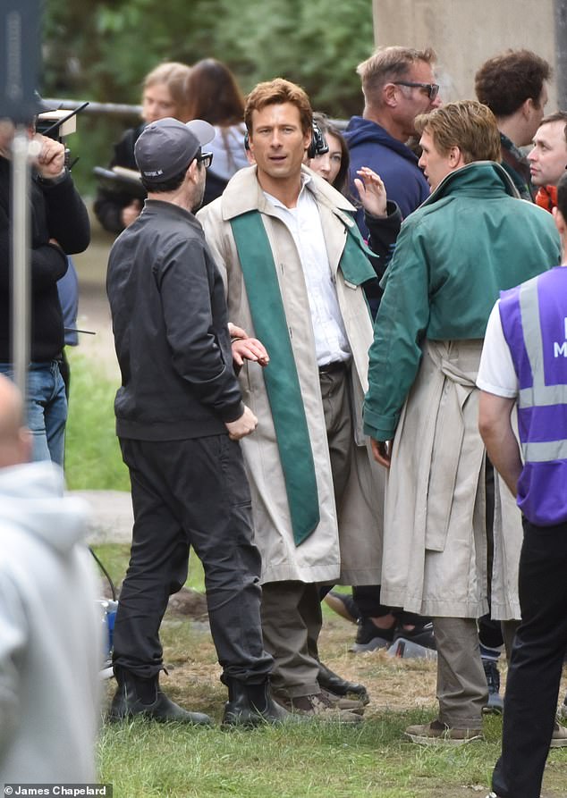 Glen Powell takes direction from J.J. Abrams during filming alongside his stunt double