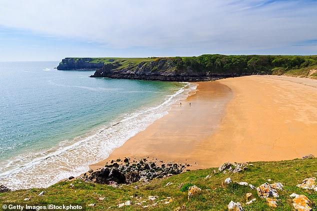 The sand and clear water of Barafundle Bay Beach in Wales mean it's often compared to Caribbean shores