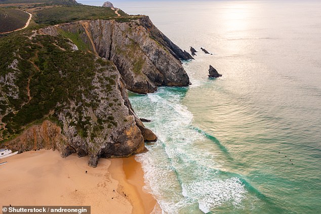 Praia da Adraga is around 35 minutes by car from Sintra in Portugal, or an hour from Lisbon