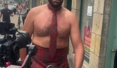 Tyson Fury has been spotted marching around a Scottish town topless and wearing a kilt