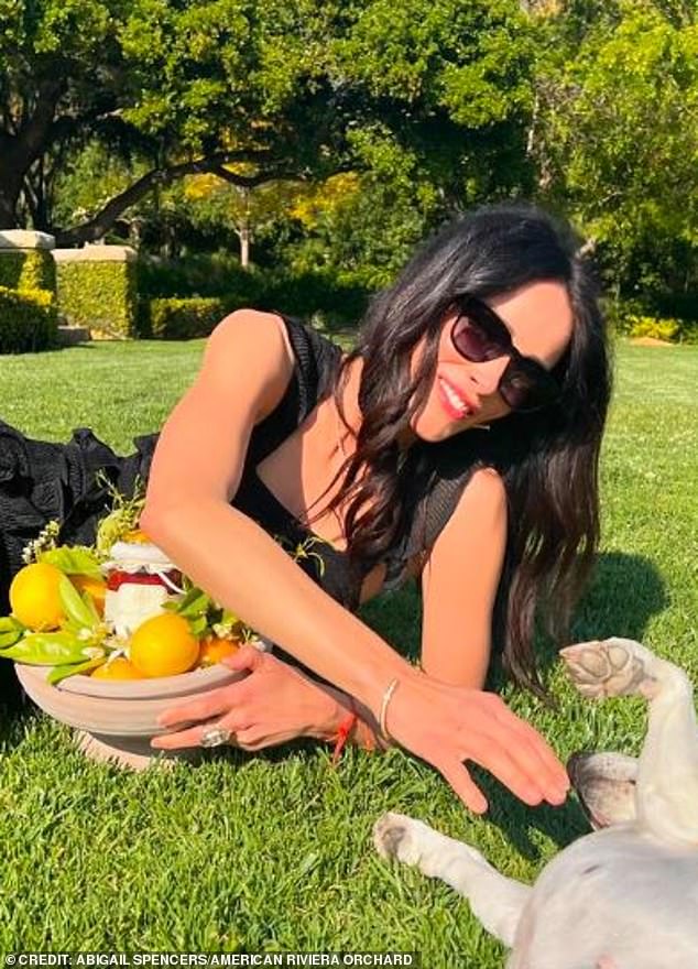 Meghan's longtime friend Abigail, pictured holding a basket from Meghan, featuring  home-made jam