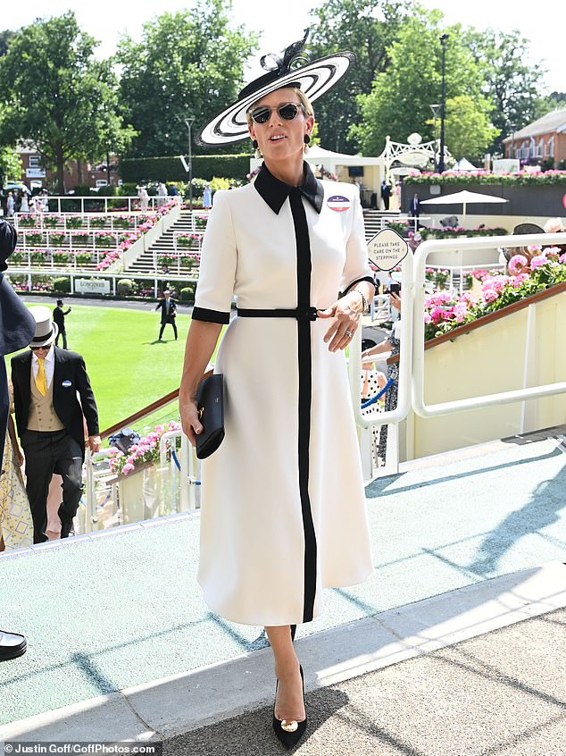 Zara opted for yet another elegant display in a black and white coat dress and heels
