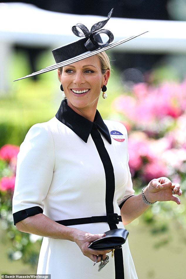A beaming Zara Tindall today, who brought her sunglasses for a day in hot temperatures