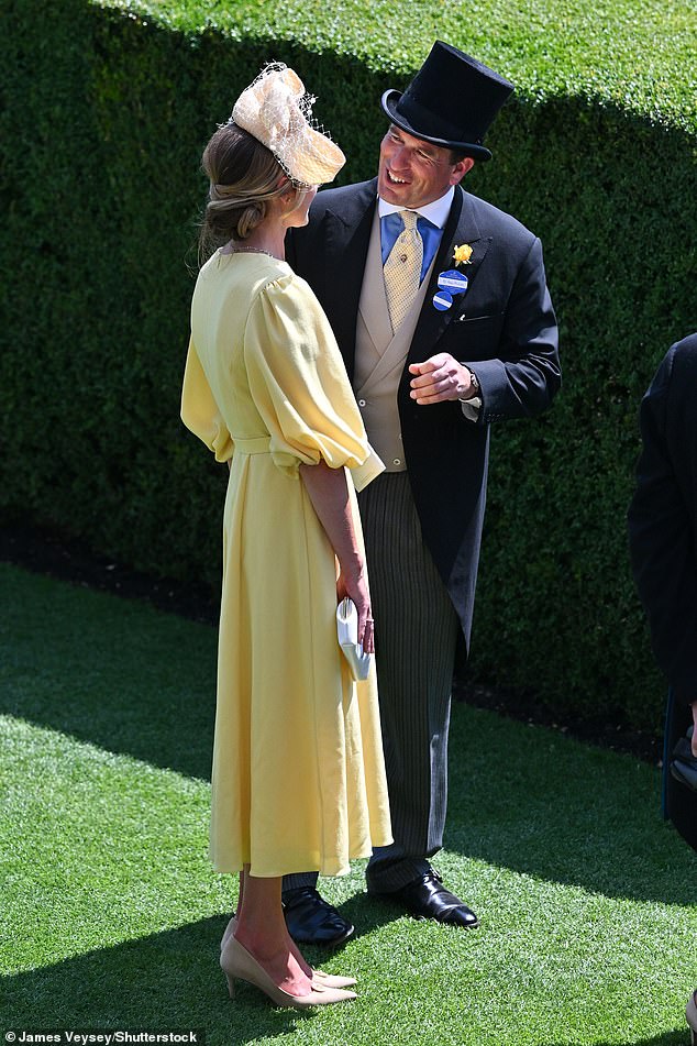 Peter seemed unable to take his eyes of his girlfriend as they were seen talking apart from the crowds