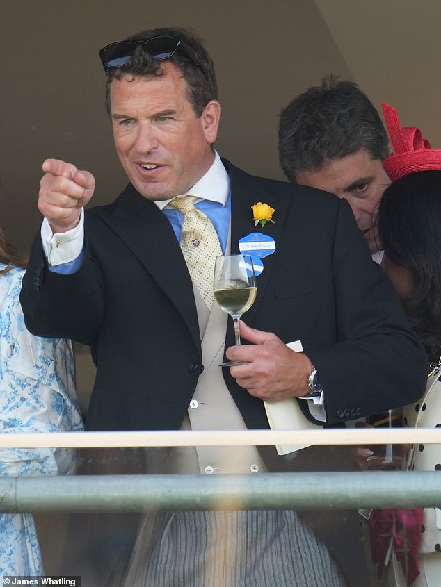 Peter Phillips was enjoying a glass of white wine as the action commenced on Thursday