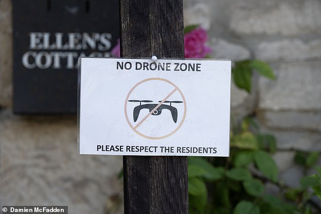 Locals have taken to putting up ‘No Drone Zone’ signs all over Castle Combe