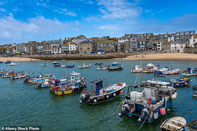 Britain's 15 best seaside spots revealed: These are the secret coastal towns the smart set flock to revealed by an expert - who tells the blockbuster places to stay... and where to go on a budget