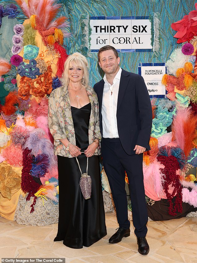 The model was joined at the event by her son Tyrone, 41, who cut a dapper figure in a navy suit for the evening