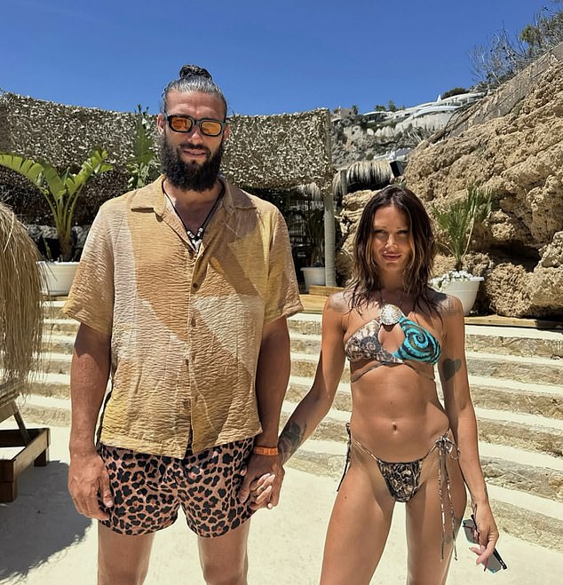 Ex-England football star Andy Carroll was questioned twice by Greek police over a series of bust-ups with girlfriend Lou Teasdale while the pair holidayed in Mykonos