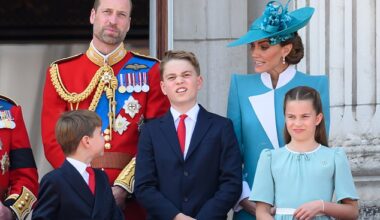 Prince George (central) stands between Prince Louis (left) and Princess Catherine (right) on the balcony at Buckingham Palace, while their parents the Prince and Princess look on