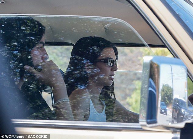 Kendall, who has inherited her transgender father Caitlyn Jenner's love of cars, was seen driving a friend around in a vintage Toyota Land Cruiser that day