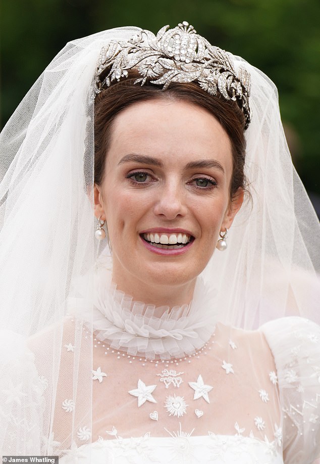 Beautiful bride: Lady Violet looked resplendent in a Phillipa Lepley couture gown on her big day