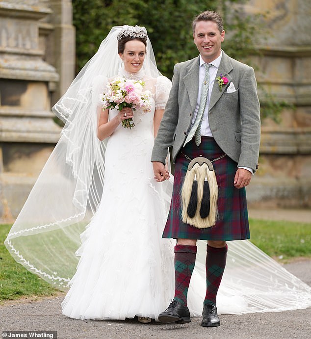 While the bride opted for a mermaid skirt couture bridal gown, the groom wore his family's traditional red and green tartan