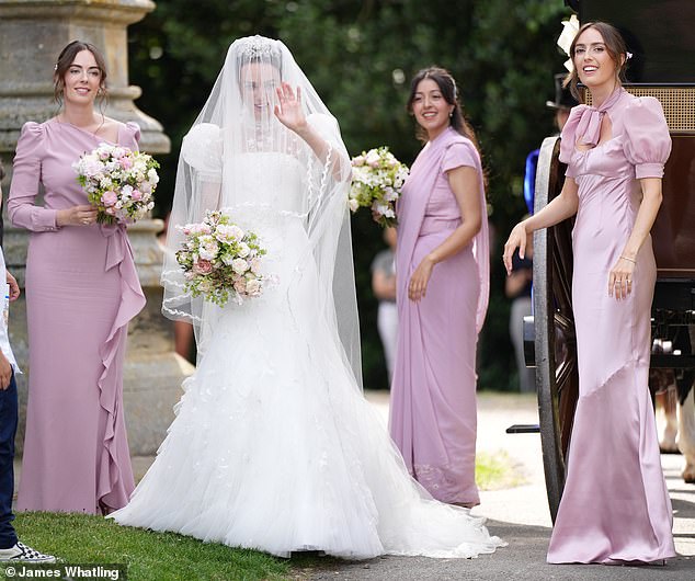 The bridesmaids looked absolutely stunning in their stylish frocks in a beautiful, delicate violet - and of course the bride was breathtaking in her traditional white gown and veil