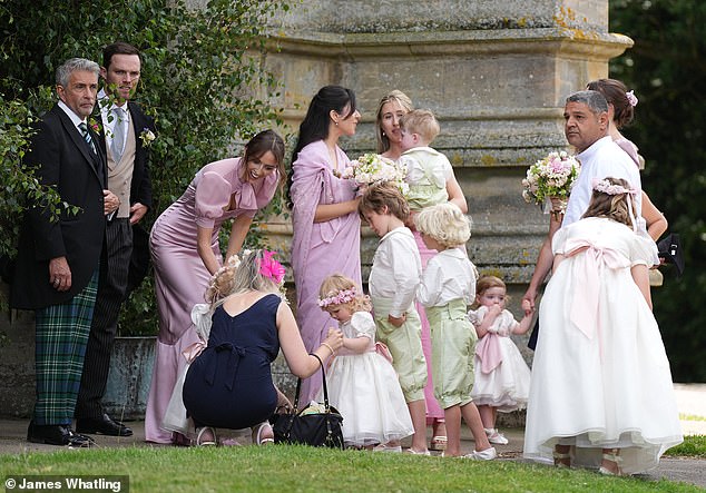 BEHIND THE SCENES: While the bridesmaids kept calm, the excitement seemed to get to some of the little flower girls at one point