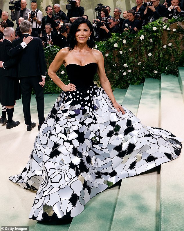Lauren pictured wearing Oscar de la Renta at the Met Gala. It may well be the designer she chooses for her wedding