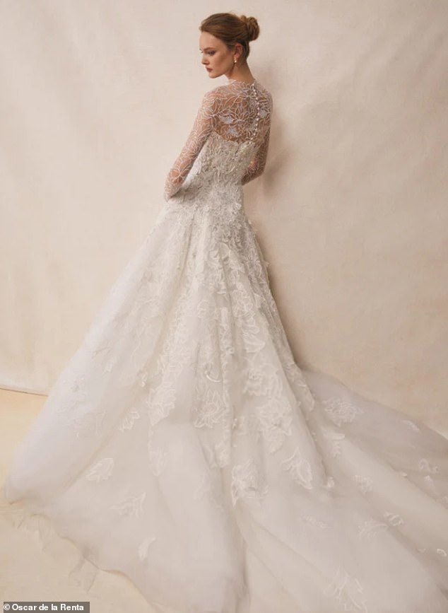 Lauren may choose to go for its 'Look 1' option (pictured), with flowing lace and tulle reminiscent of a butterfly's wing