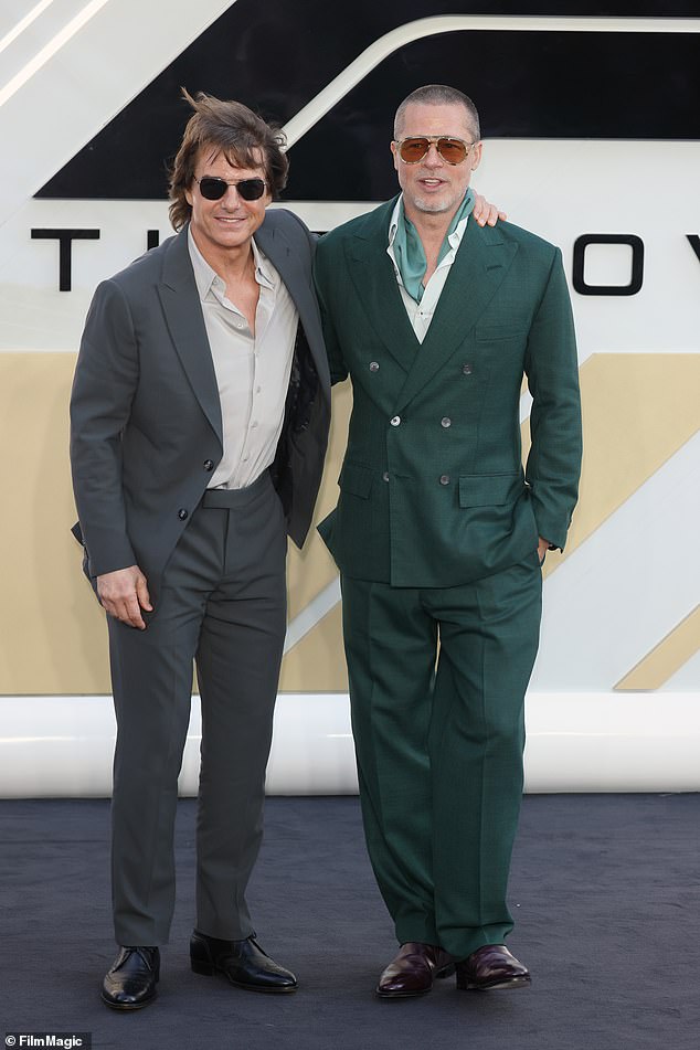Brad Pitt looked dapper as he stepped out British Racing Green-coloured suit as he teamed up with Hollywood icon Tom Cruise for the European premiere of F1: The Movie in London on Monday