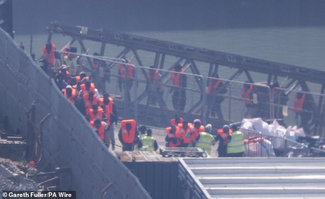 Migrants arriving at Dover last month: now a new deal is afoot to allow them to be returned to France almost immediately, according to reports
