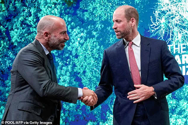 The Prince of Wales was photographed shaking hands with Uber CEO Dara Khosrowshahi