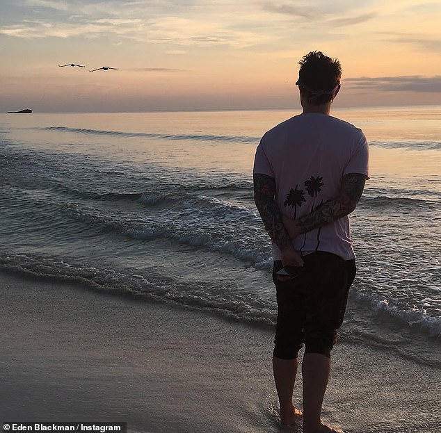 His family shared a trio of photos of Eden beaming at the camera, laughing in a recording booth and and standing at the beach looking out over the sea