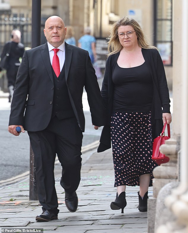 Jamie Brown, pictured with his wife Nina Brown, has been jailed after he took around £100,000 from families, ripped out their kitchens and fled with their money