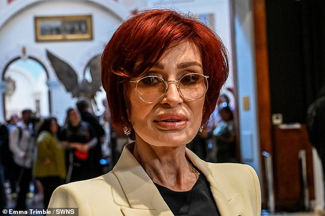 Sharon Osbourne showed off her very plump pout as she attended her husband Ozzy's 'Working Class Hero' exhibition at Birmingham's Museum and Art Gallery on Wednesday