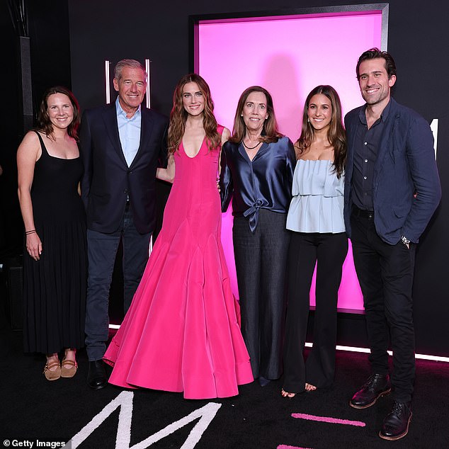 The couple posed for a group photo with their talented daughter