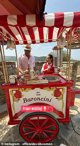 Seaman appears to enjoy some ice cream at a food cart