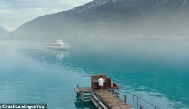 One of South Korea's most famous Kdramas has sparked an influx of tourists to a tiny Swiss village in recent years - and the canny European country is now charging visitors for selfies there (Pictured: A scene from Crash Landing on You filmed in Iseltwald)