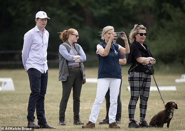 Meanwhile, Sophie was seen at the perimeter of the course grabbing photos of the sweet moment. The Duchess of Edinburgh pictured