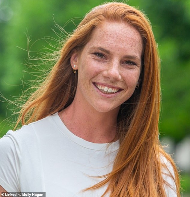 It wasn¿t until Hagan (pictured) hurried toward the growing crowd of nearly 50 onlookers that she realized what had captured everyone¿s full attention: a massive grizzly on the move along the left-hand side of the road