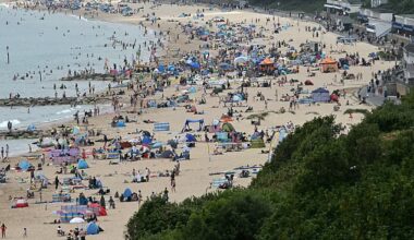 ENGLAND -- Sunbathers cover the beaches in Bournemouth on the south coast