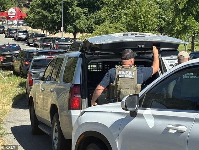 US Marshals were pictured at the scene of the shooting on Sunday evening