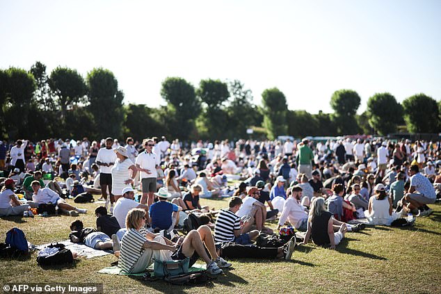 Tennis fans queue for tickets on the first day of the 2025 Wimbledon Championships